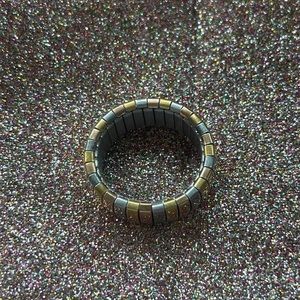 Stainless steel tricolored ring.